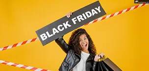 Cruise_Holidays Excited woman holding a Black Friday sign and black shopping bags, with a yellow background and tape