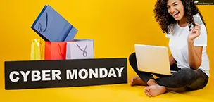 Cruise_Holidays Happy woman shopping online with a laptop, colorful bags, and