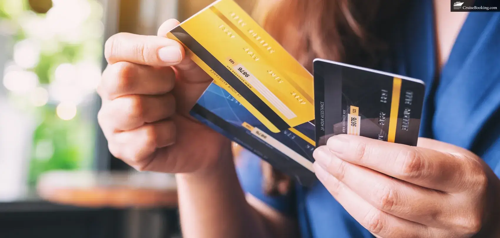 An image of a woman choosing a credit card