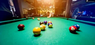 Man Playing Billiards