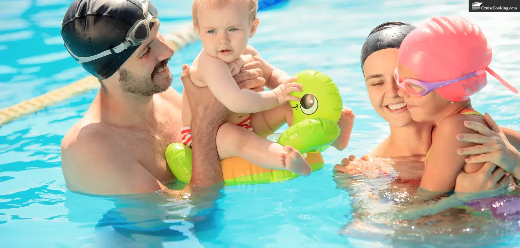 A happy family enjoying a swim in the pool