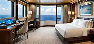 A luxurious cruise ship cabin with a large window and ocean view.