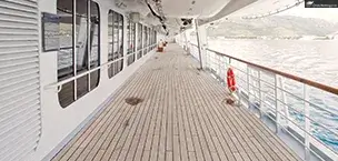 Empty cruise ship deck with life preserver