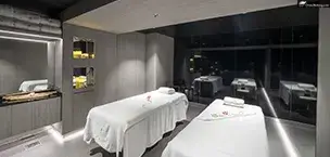 MSC Seashore public area - MSC Aurea Spa cabin with two massage tables and a calming ambiance