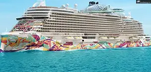 Large cruise ship, Norwegian Aqua, on blue water