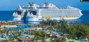 Royal_Caribbean_Cruise_Tips Oasis and Symphony of the Seas ship docked at pier