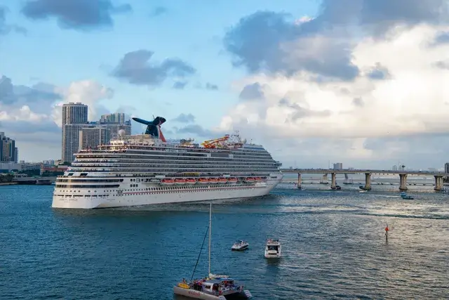The big Carnival cruise ship is in the harbor in Miami, Florida, United States