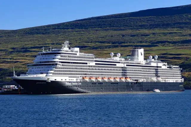 Holland America cruise ship docked in harbor