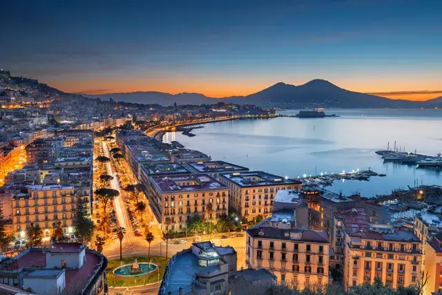 Skyline of Naples, Italy with Mount Vesuvius in the distance