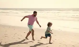 father running behind his son and playing with him