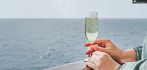 glass held woman on deck